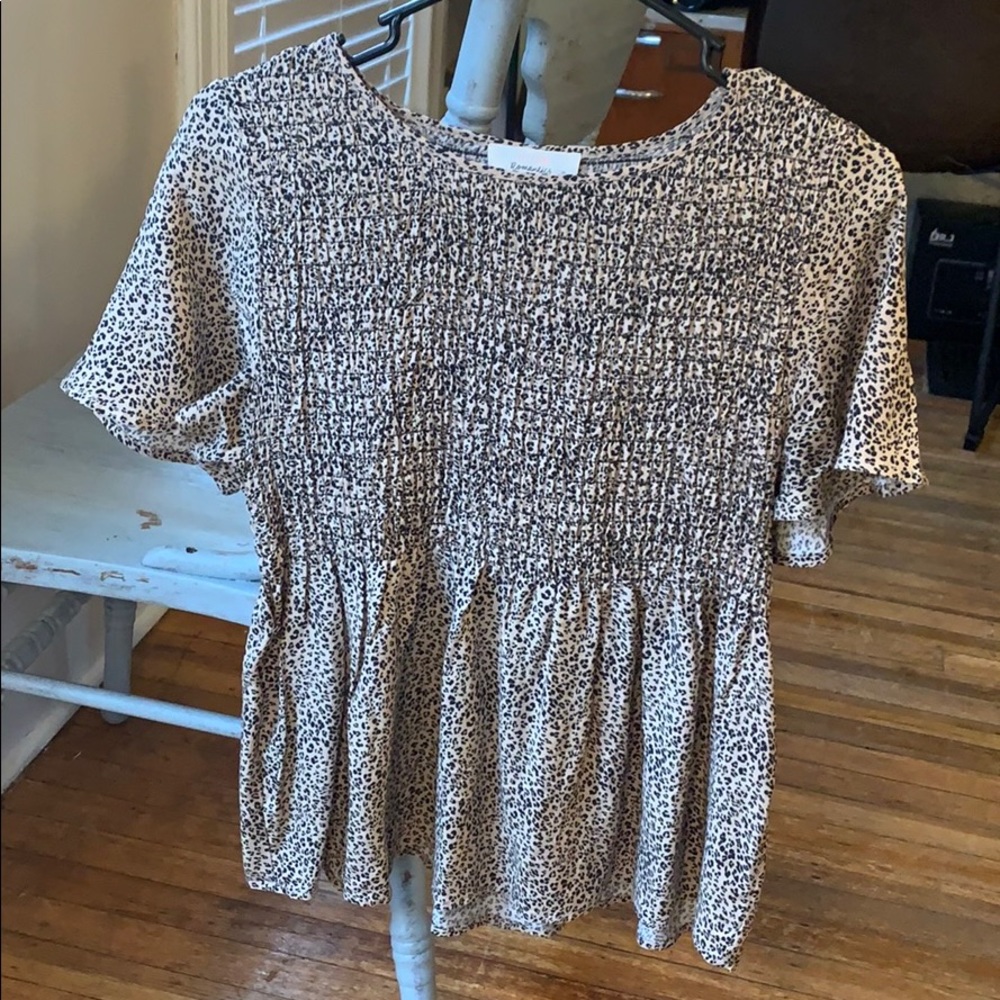 Pleated cheetah print shirt